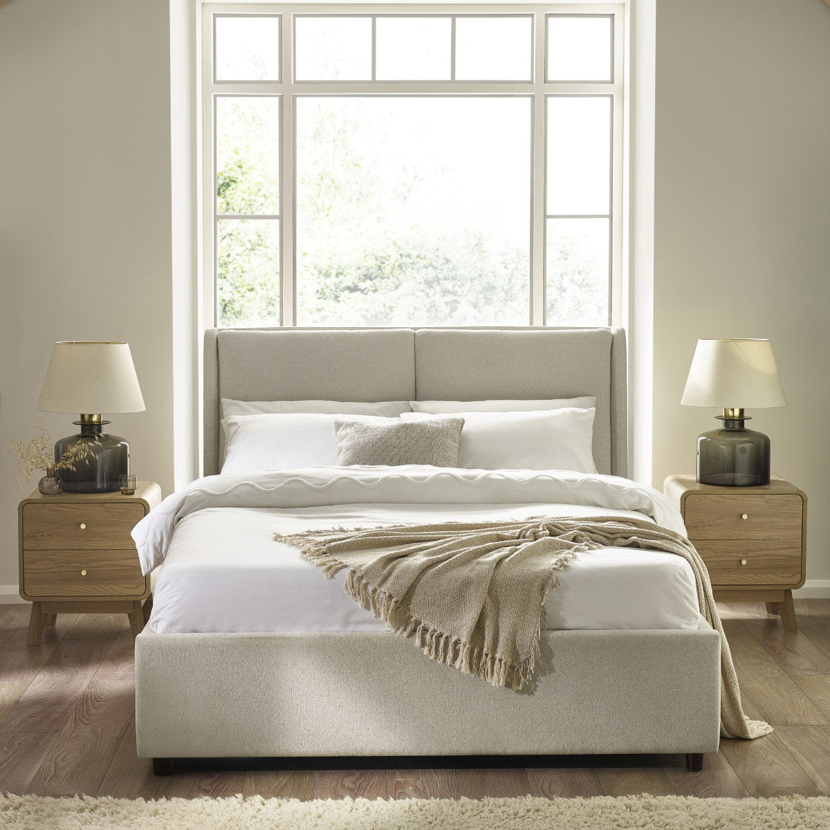 Fifth Avenue Beige Double Ottoman Bed in a bedroom