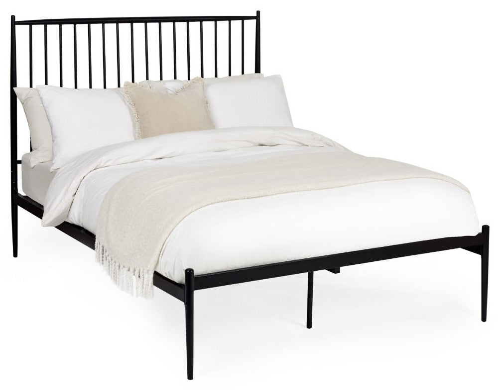 Flyde black metal bed frame dressed with bedding