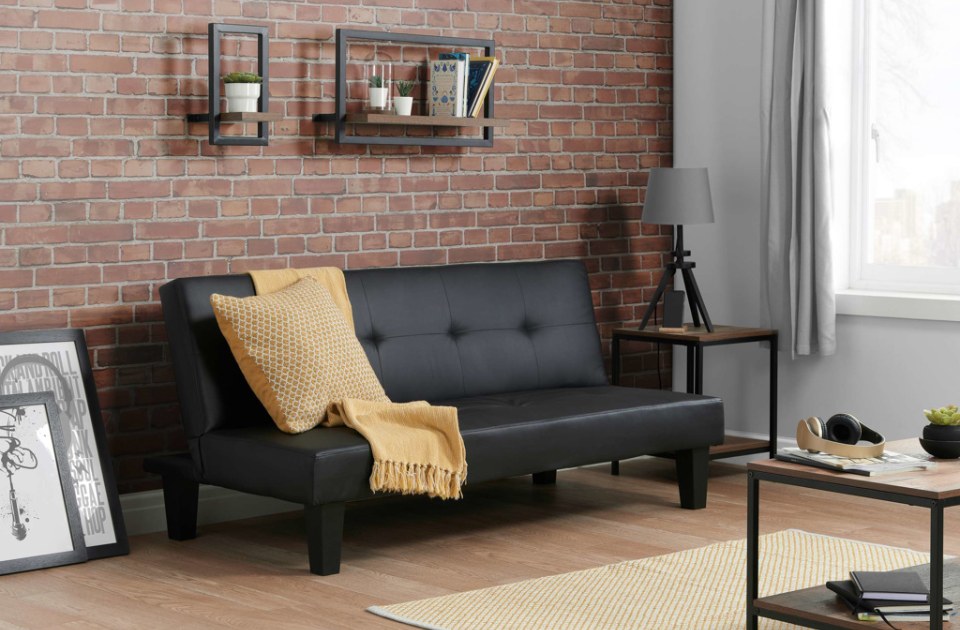 Frankie Sofa Bed Black in a room