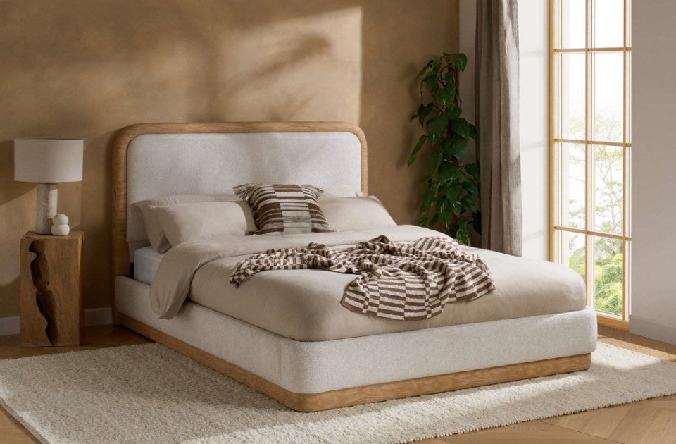 Gina White Bed Frame in a bedroom