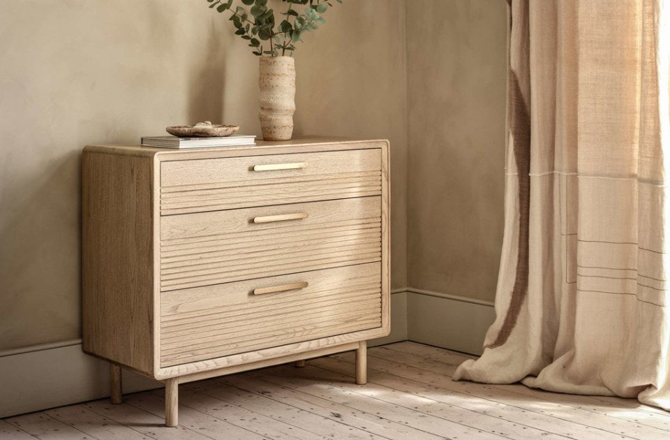 Harlem Oak 3 Drawer Chest in a bedroom