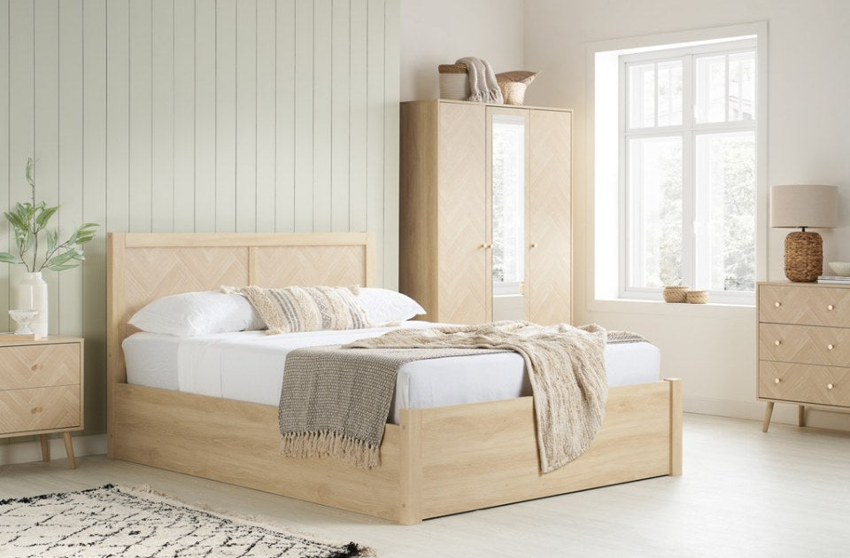 Hemmingway Oak Ottoman Bed in a bedroom