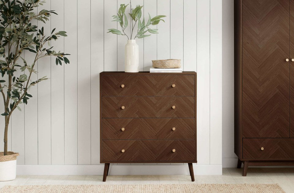 Hemmingway Walnut 4 Drawer Chest in a bedroom