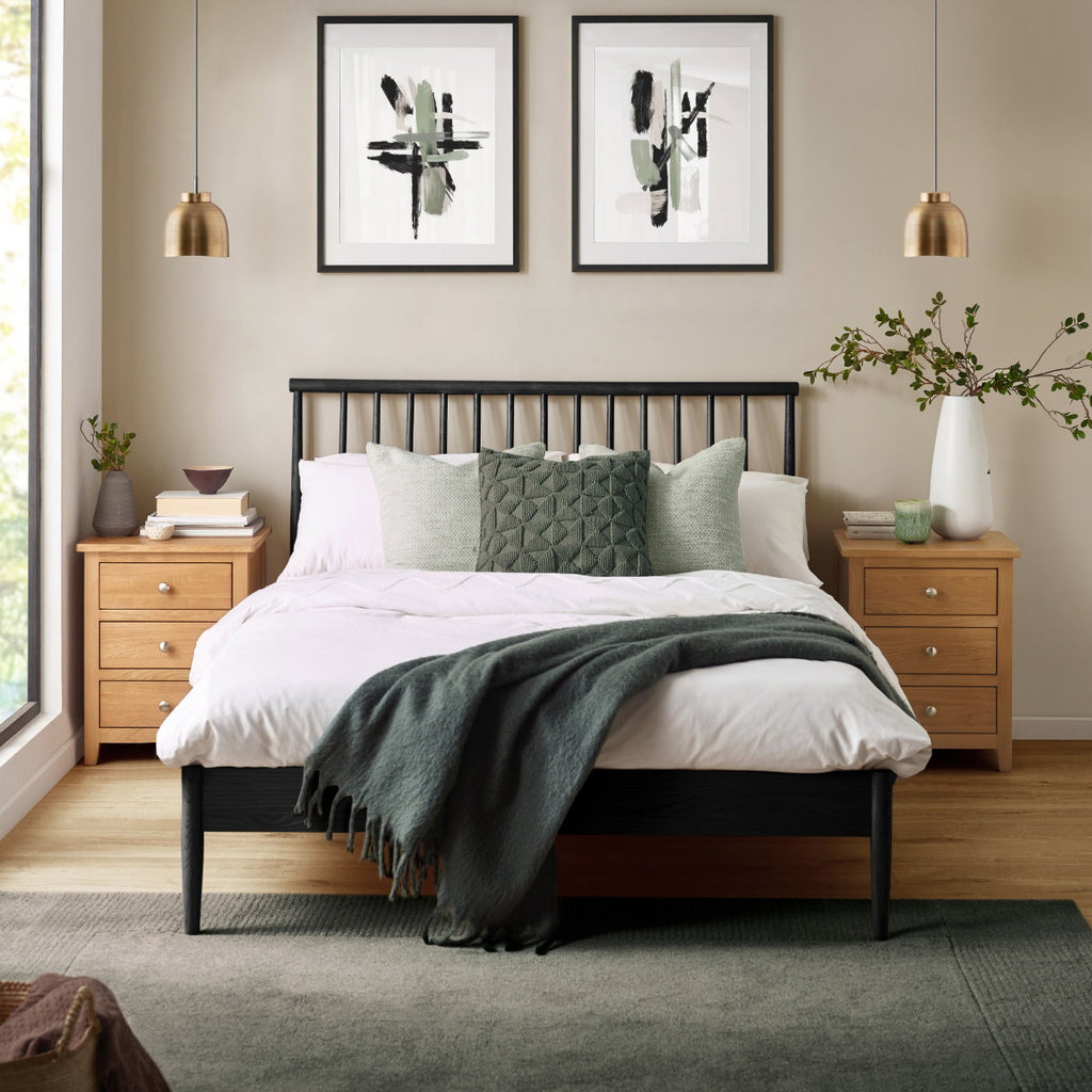 Label Black Oak Spindle Double Bed Frame in a bedroom