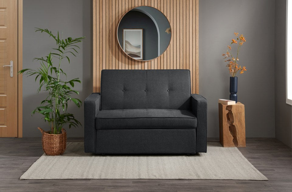 Lotto Sofa Bed Grey in a living room