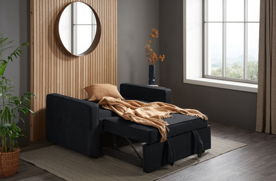 Lotto Sofa Bed Grey made up as a bed