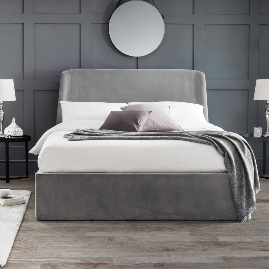 Luigia Grey Velvet King Size Ottoman Bed in a bedroom