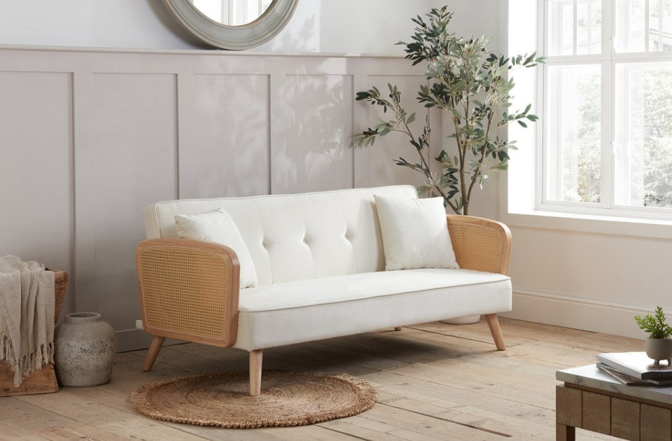 Milly Sofa Bed White in a living room