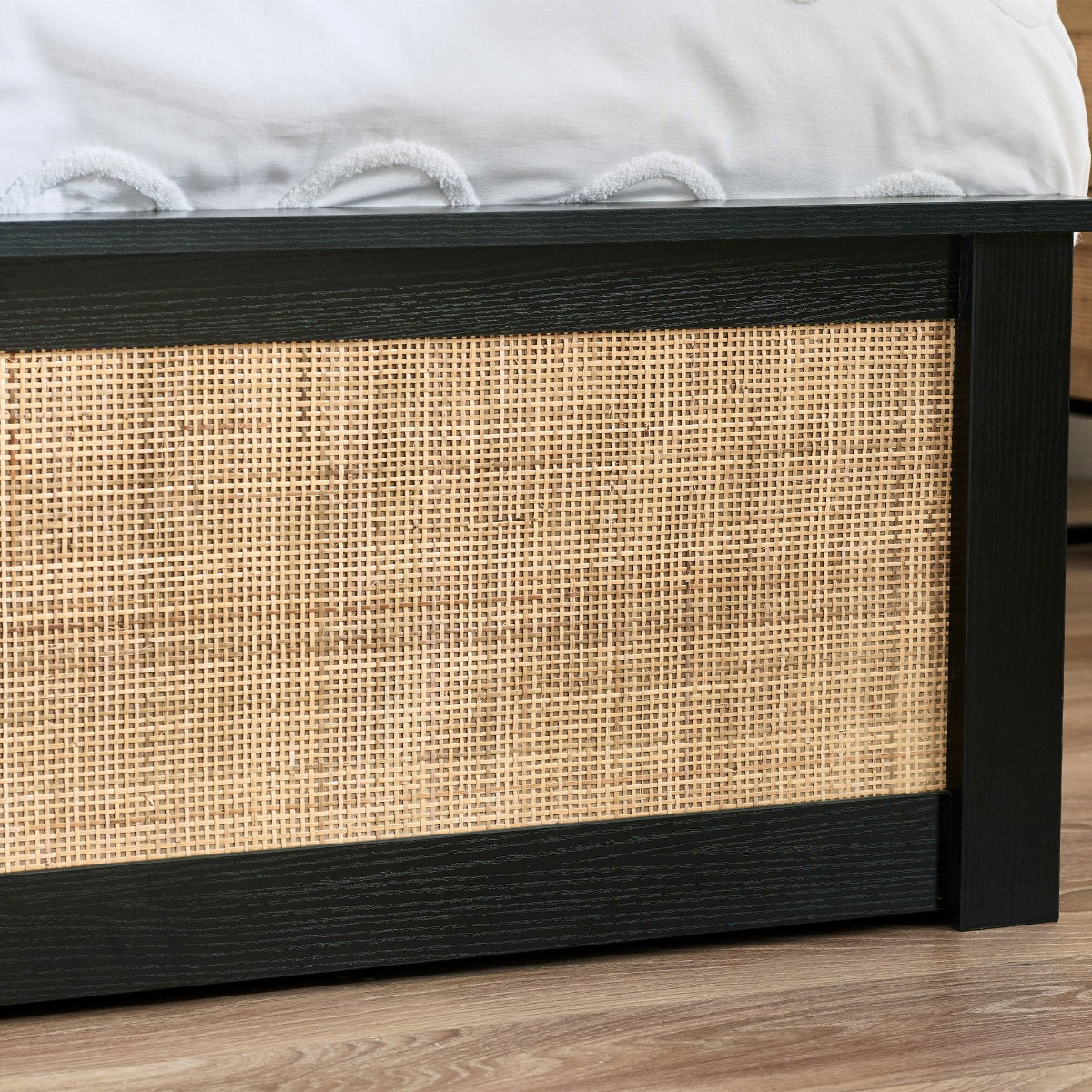 Paddy black rattan ottoman storage detail