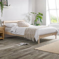 Sammy Pine Double Bed Frame in a bedroom